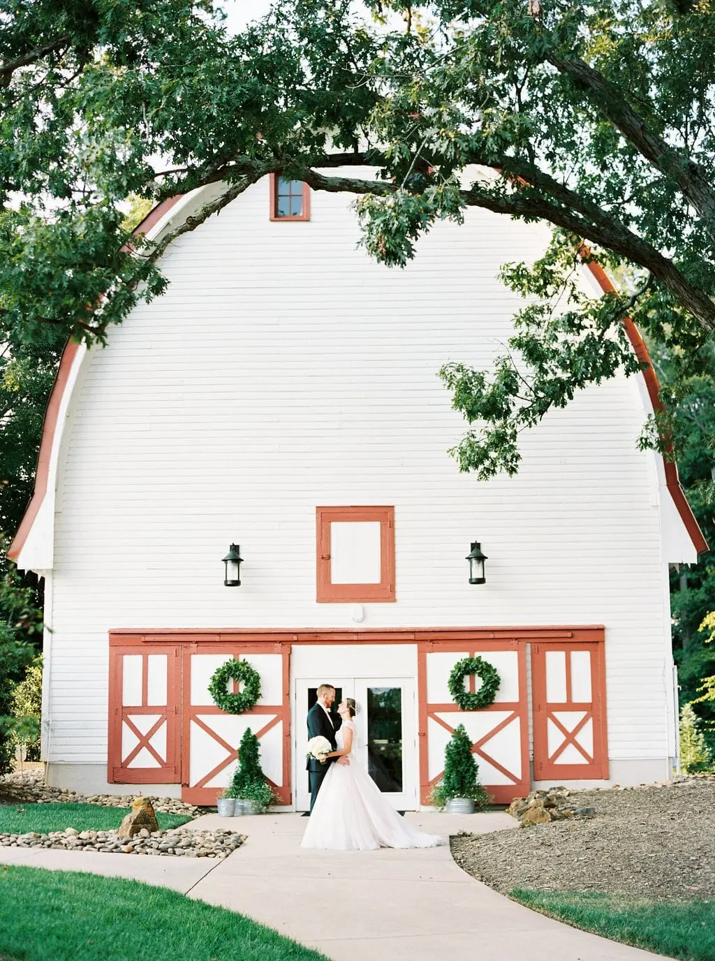 The Main Barn at WinMock, white with red trim