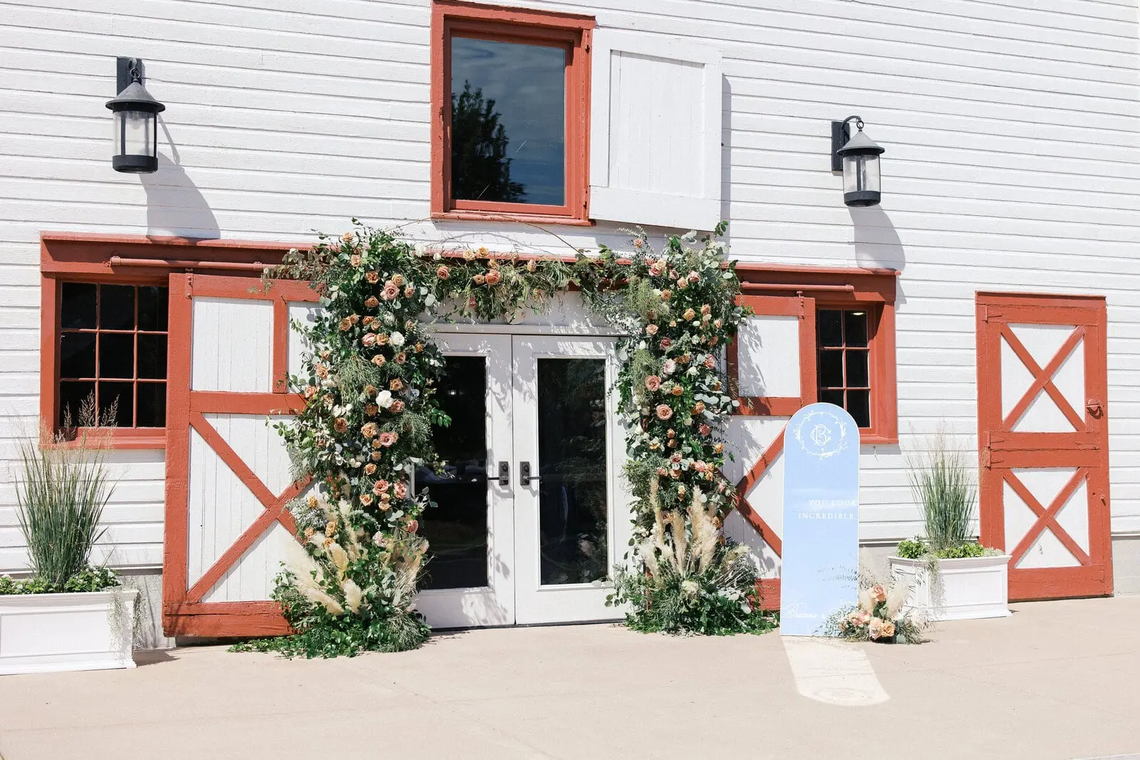 The Main Barn at WinMock, white with red trim