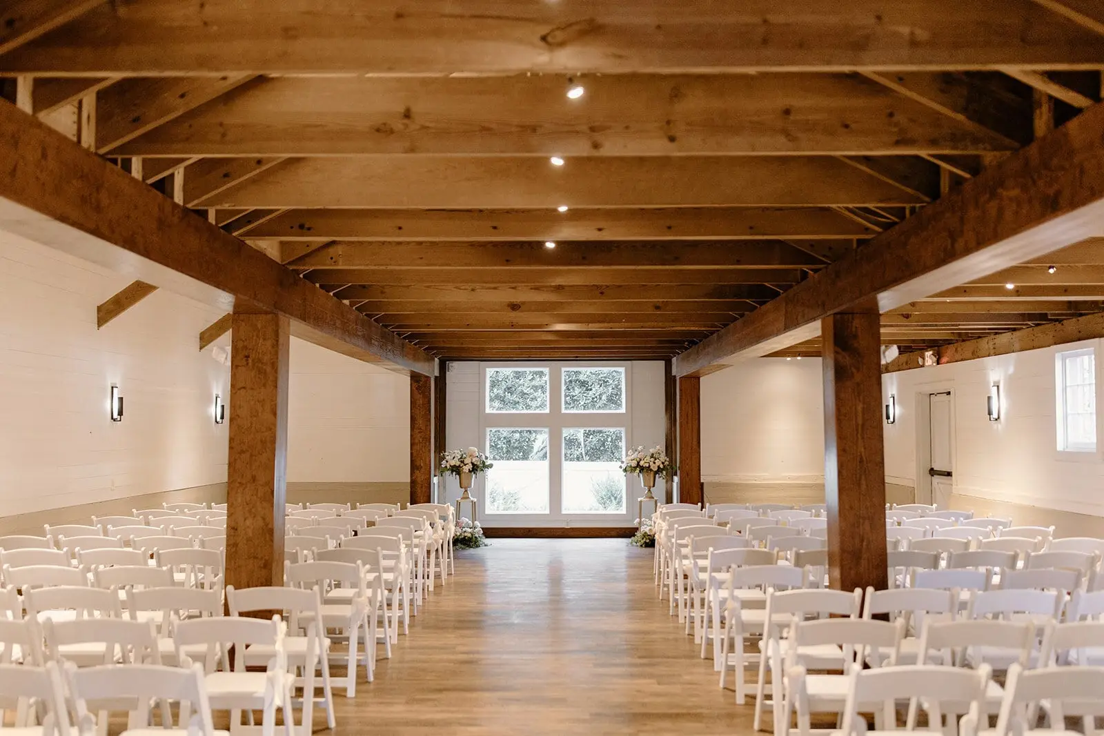 The Main Barn at WinMock, white with red trim